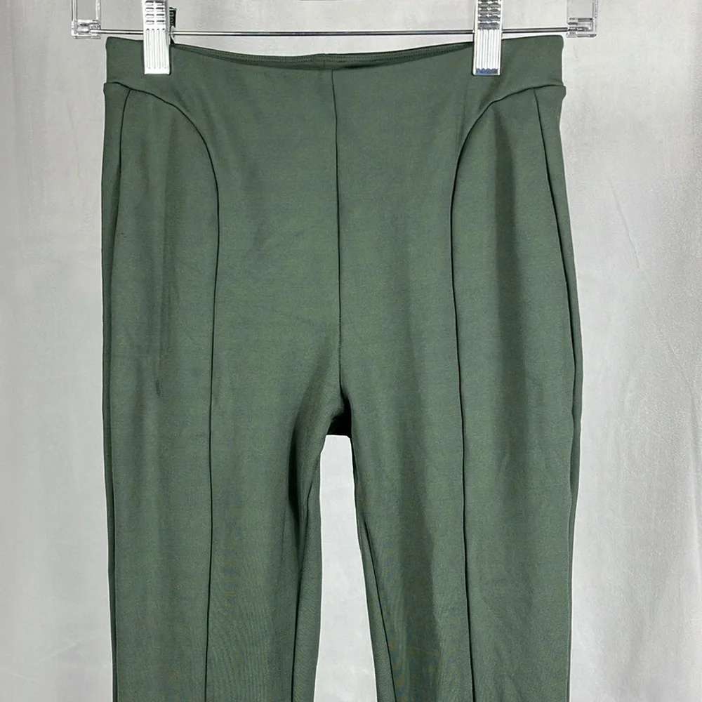 Alo‎ Yoga High-Waist Zip it Flare Legging in Dark Cactus Green.